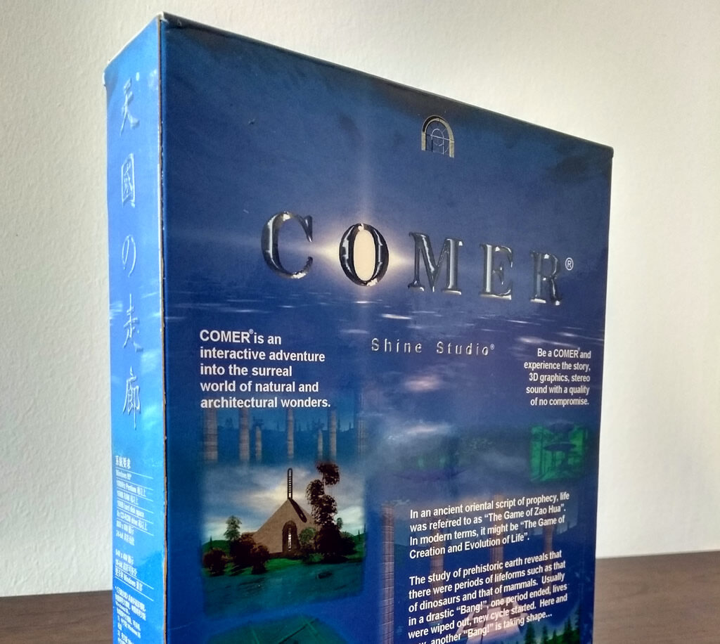 The box for Comer by Shine Studio. The front of the box reads: “COMER is an interactive adventure into the surreal world of natural and architectural wonders. Be a COMER and experience the story, 3D graphics, stereo sound with a quality of no compromise. In an ancient oriental script of prophecy, life was referred to as ‘The Game of Zao Hua.’ In modern terms, it might be ‘The Game of Creation and Evolution of Life.’ The study of prehistoric earth reveals that there were periods of lifeforms such as that of dinosaurs and that of mammals. Usually in a drastic ‘Bang!’, one period ended, lives were wiped out, new cycle started. Here and now, another ‘Bang!’ is taking shape...”